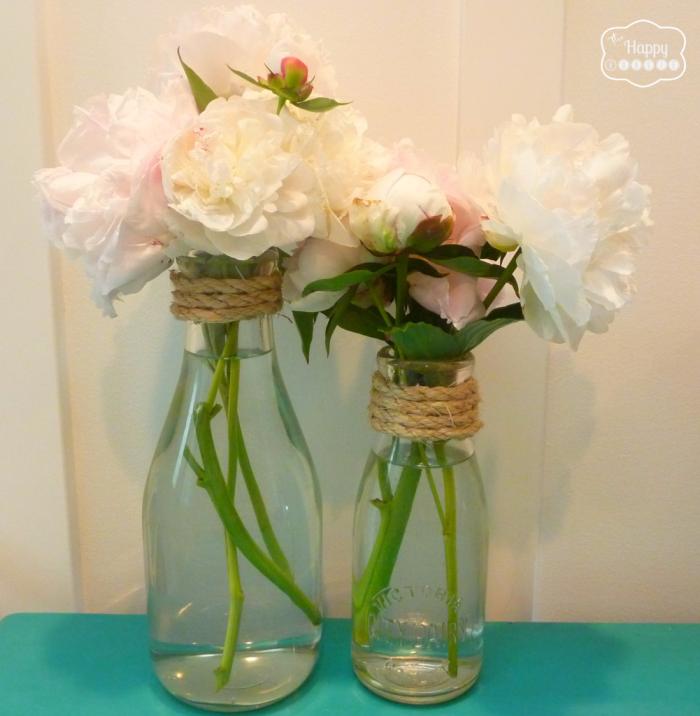 simple-sisal-rope-embellishement-on-vintage-milk-bottles-at-thehappyhousie-1001x1024