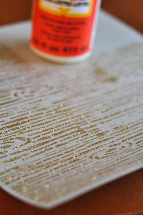 Mod Podge Rocks Wood Grain Stencil with gold glitter on paper - Suburble.com (1 of 1)