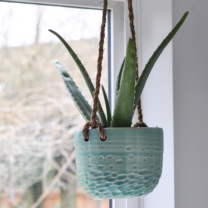 A Pretty Planter In The Window Suburble